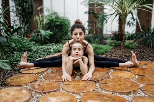 mother and daughter yoga pose